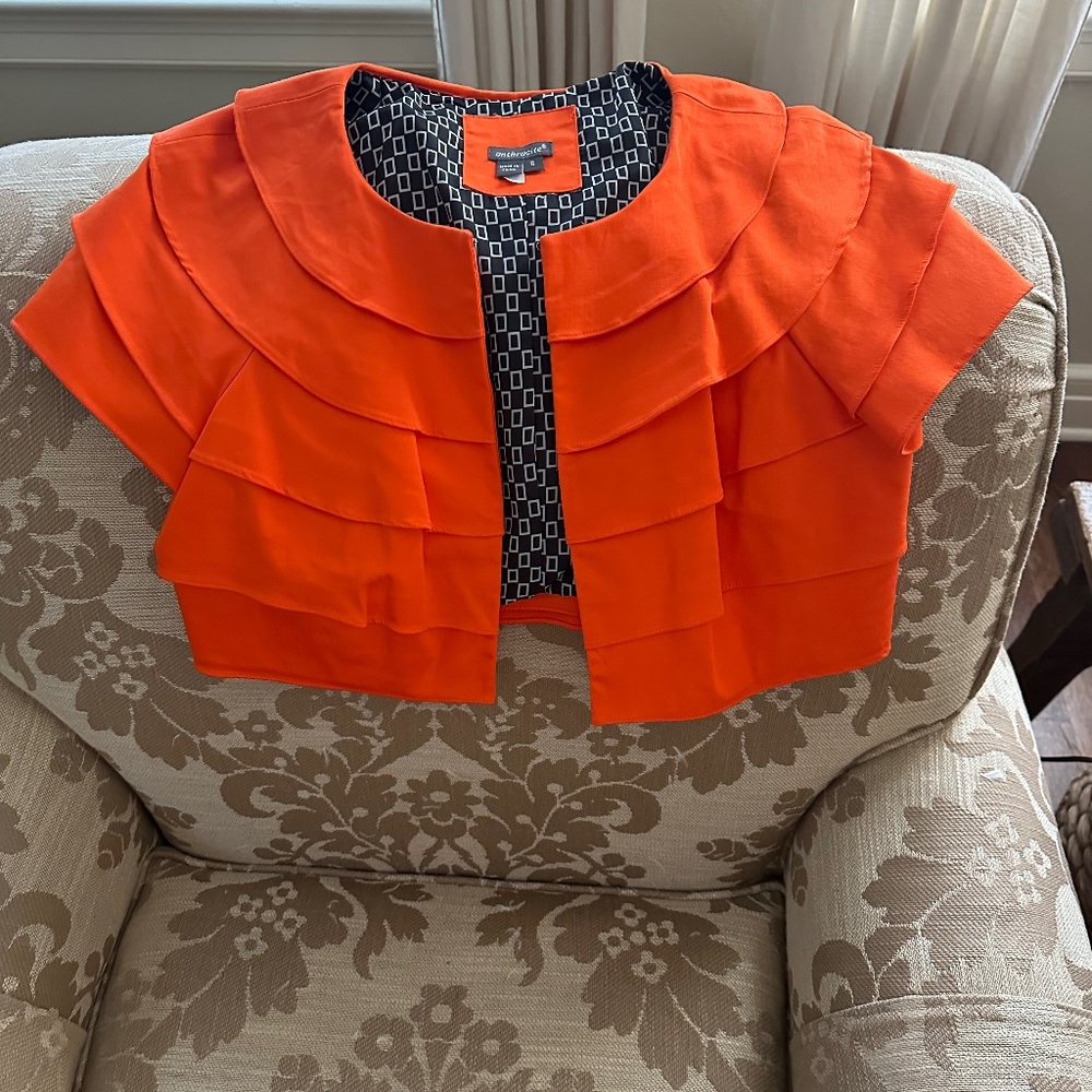 Vibrant orange bolero jacket